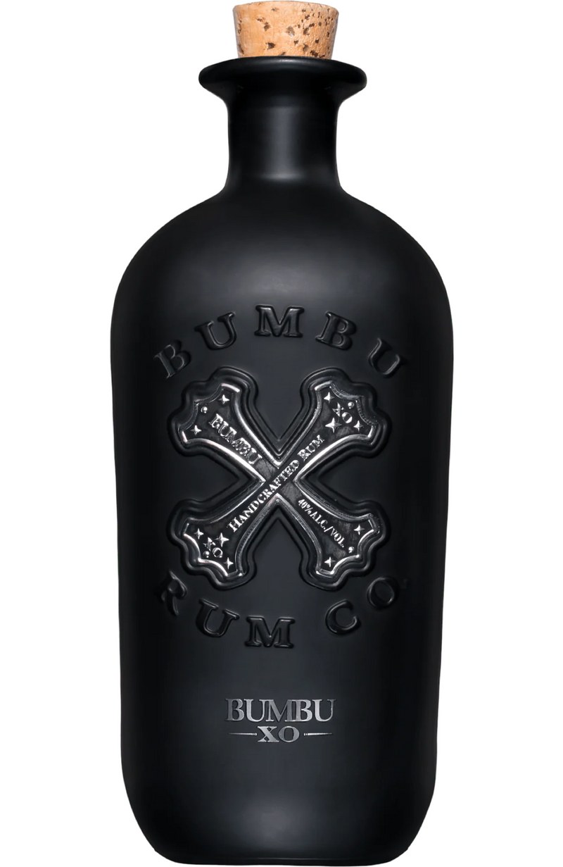 Bumbu XO 40% 70cl from Spades Wines & Spirits. A premium rum crafted in Panama, aged up to 18 years in bourbon barrels and finished in sherry casks. It boasts rich aromas of toffee, vanilla, orange zest, and a hint of spice, leading to a smooth palate with notes of caramel, oak, and roasted nuts. Ideal for sipping neat or elevating classic rum cocktails.