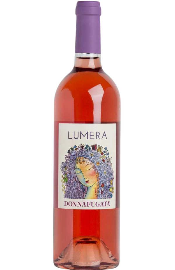 Donnafugata - Lumera Rosato DOC 75cl from Spades Wines & Spirits. This elegant Sicilian rosé dazzles with aromas of wild strawberries, pomegranate, and rose petals, complemented by hints of Mediterranean herbs. On the palate, it is fresh and harmonious, offering vibrant acidity and a fruity, long-lasting finish. Ideal for pairing with charcuterie, seafood dishes, light salads, or soft cheeses. A sophisticated expression of Sicily's coastal charm.