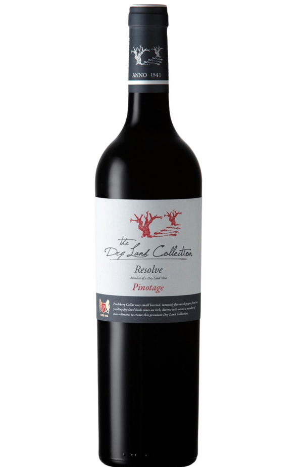 Perdeberg - Dry Land Collection Resolve Pinotage 75cl from Spades Wines & Spirits. This bold and expressive Pinotage from South Africa showcases rich flavors of dark fruit, blackberries, and plums, complemented by hints of spice and subtle oak. The wine’s firm tannins and velvety texture create a full-bodied profile with a smooth finish, making it an excellent match for grilled meats, barbecued dishes, or rich stews. A true representation of the unique terroir of the Perdeberg region, this Pinotage is