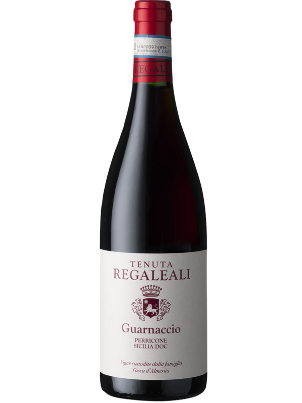 Discover Tasca d'Almerita Tenuta Regaleali Guarnaccio Perricone 75cl from Sicily at Spades Wines & Spirits. This deep ruby red wine features bold flavors of ripe red berries and black cherry, with subtle earthy notes and smooth tannins. Ideal with roasted pork, grilled sausages, or rich pasta, it enhances any hearty meal with its complex and refined profile.