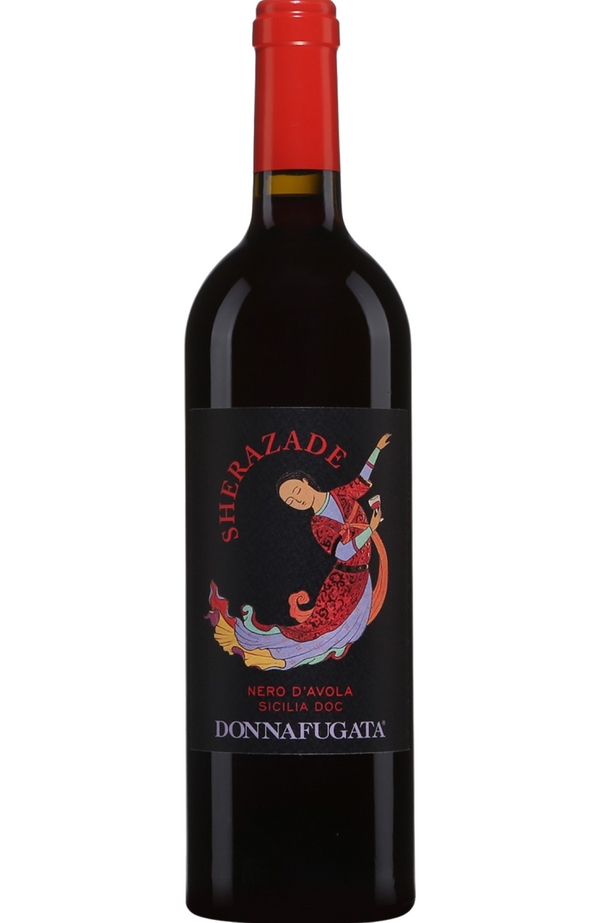 Donnafugata - Sherazade Nero D'Avola 75cl from Spades Wines & Spirits. A vibrant and expressive Sicilian red, this Nero d'Avola reveals aromas of ripe blackberries, cherries, and hints of spice. On the palate, it’s smooth and well-balanced, with soft tannins and a lingering, fruit-forward finish. Ideal for pairing with pasta dishes, grilled meats, or mild cheeses, it offers a true taste of Sicily’s rich winemaking heritage. A perfect choice for those seeking an approachable yet flavorful red wine.