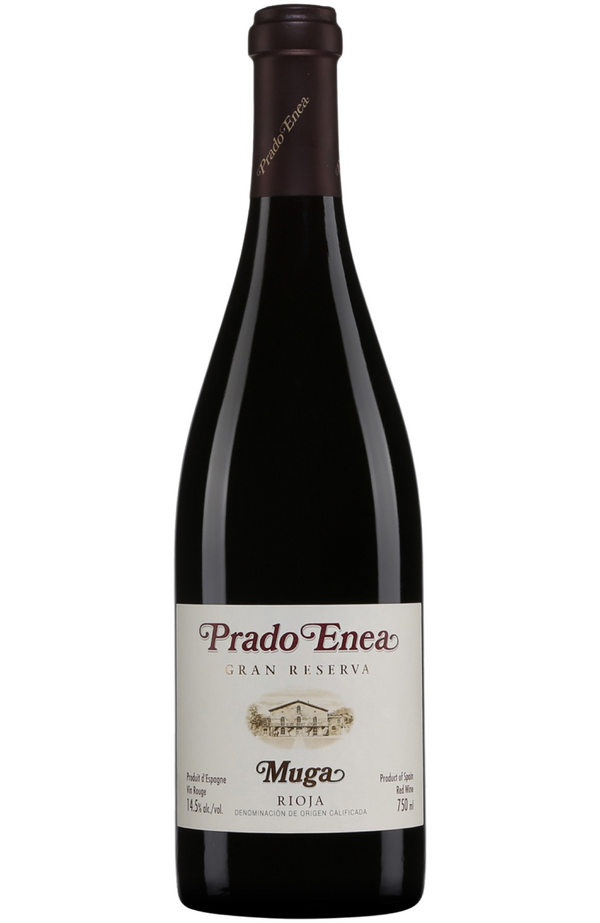 Muga - 'Prado Enea' Rioja Gran Reserva 75cl from Spades Wines & Spirits. A classic Gran Reserva crafted from Tempranillo, Garnacha, Mazuelo, and Graciano. Aromas of dried red fruits, leather, and tobacco are enriched by hints of spice and vanilla from extended oak aging. The palate is elegant and refined, with fine tannins, vibrant acidity, and a lingering, complex finish. Perfect with roasted lamb, hearty stews, or aged Manchego cheese. A timeless expression of Rioja’s grandeur.