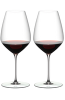 Two Riedel Syrah wine glasses filled with red wine, perfect for premium wine tasting and enjoyment.